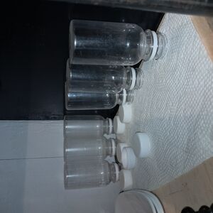 Clear plastic juice Jars with White Lids